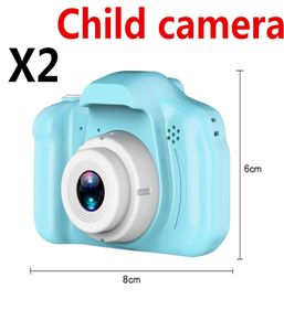 X2 De nieuwste Children039s camera mini digitale camera 2inch cartoon schattige camera speelgoed kinderen het cadeau 1080p dh peuter dhl2148298