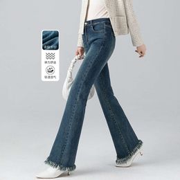 Xin Ge Micro La Jeans Dames hoge taille afslankende elastische slanke pasvorm Franse korte negenpunts flare-broek Trendy