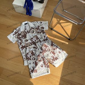 Xinxinbuy Hommes Designer Tee T-shirt 23ss Lettre florale Ensembles d'impression à manches courtes en coton Femmes Noir Blanc Gris Vert S-2XL