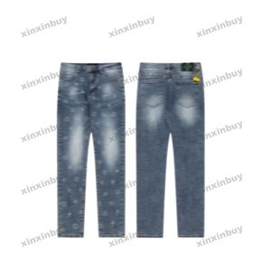 Xinxinbuy Hommes Femmes Designer Pantalon Jacquard Lettre Stripe Poches Denim Jeans 1854 Printemps Été Pantalon décontracté Noir Bleu Gris M-2XL