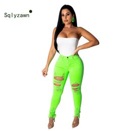 XXL neón verde naranja sexy cintura alta jeans pantalones mujeres elástico agujeros casual denim pantalones streetwear más tamaño lápiz pantalones 201014