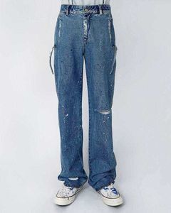 Yang Ader MI's onregelmatige plons inkt en gat jeans in de lente zomer