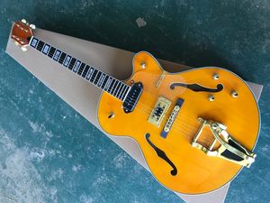 Guitare électrique à corps jaune avec Pickguard transparent, incrustation de touche de style animal, système Tremolo, peut être personnalisée