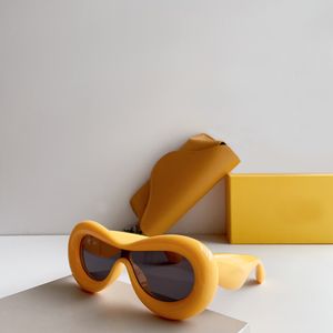 Lunettes de soleil ovales jaunes épaisses pour femmes, nuances de fête à la mode, lunettes de soleil de styliste Sonnenbrille UV400 avec boîte