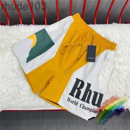 Pantalones cortos amarillos de patchwork Sunset Rhude hombres mujeres dentro de pantalones de malla con cordón Kifj R1ql 36UB