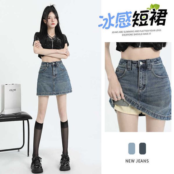 YKK fermeture éclair été anti-éblouissement lavage à l'eau taille haute sac fesses jupe en jean femmes a-ligne jupe courte design de niche