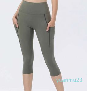 Yoga Capris peau nue amical mode vêtements de sport femmes Leggings collants décontracté athlétique course Fiess pantalons de sport