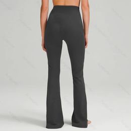 Gurra de yoga Mujeres de verano Pantalones acampanados Ropa de vientre de cintura ajustada Show Figuras Sports Yogas Pantalones de nueve puntos