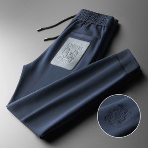 Yoga hommes pantalons tenue Sport cordon sec poches de gymnastique pantalons de survêtement pantalons hommes décontracté taille élastique pantalon pour hommes taille asiatique M-5XL