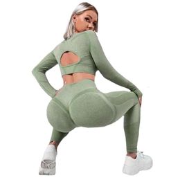 Yoga Outdoor Bottom Fiess Peach Hip Hollow Strakke broek met lange mouwen Sport tweedelige set