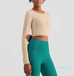 Tenue de Yoga à rayures cachées Super confortable Sport entraînement hauts courts femmes Slim Fit O cou 25 hauts courts de gymnastique à manches longues chemises de Yoga