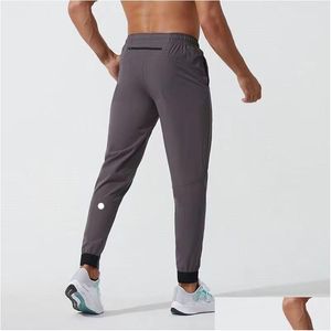 Yoga Outfit LL Hommes Jogger Pantalons longs Sport Yoga Outfit Séchage rapide Dstring Gym Poches Pantalons de survêtement Pantalons Casual Taille élastique Fitness Dhhgw