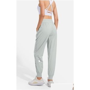 Yoga outfit ll vrouwen joggen negende broek pocket fitness leggings zachte hoge taille heup lift elastische casual dstring poten joggingbroek drop otnry