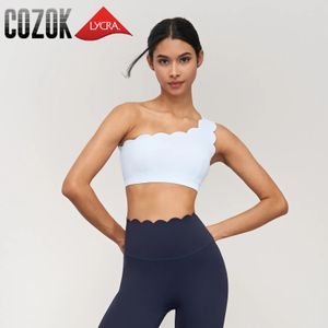 Yoga Outfit Lycra Sports Soutien-gorge pour femmes sans couture antichoc Coupe fixe Gym Tops d'entraînement Lotus Arc Single épaule Pushup Bras Gilet 231023
