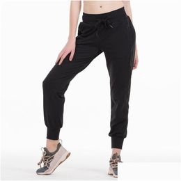 Tenue de yoga nue Feel Tissu Travail Sport Joggers Pantalons Femmes Taise Dstring Fitness Running Sweat Panters With Two Side Pocket Styl OT3LB