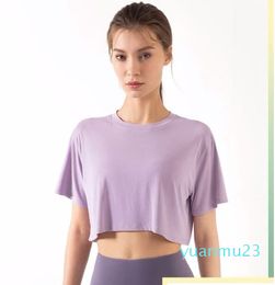 Tenue de yoga Nouvel été Haut ample Vêtements Fitness Crewneck T-shirt à manches courtes Courir Sports Smock Drop Livraison à l'extérieur