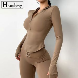 Tenue de yoga en cours d'exécution veste élastique perte de poids haut femmes sport gymnase à manches longues serré sweat à capuche 231117