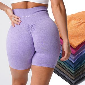 Traje de yoga Scrunch Pantalones cortos sin costuras Entrenamientos elásticos Leggins cortos Trajes de fitness fruncidos Forma favorecedora Ropa de gimnasio Bordado NVGTN 230717