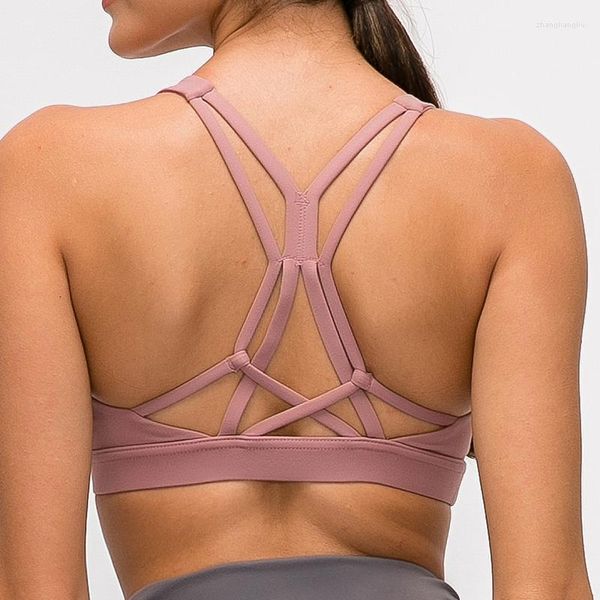 Traje de yoga Sujetadores de fitness inalámbricos Hermosos tops deportivos de entrenamiento con tiras Mujeres Naked-Feel acolchado Push Up Athletic