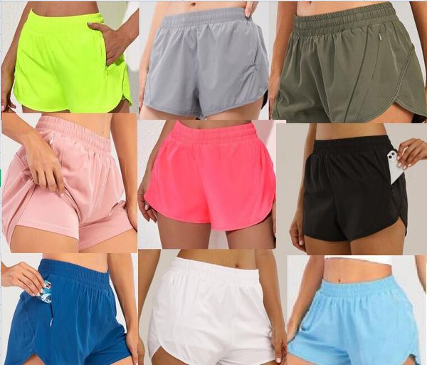 Trajes de yoga 10 colores Lu Yoga Pantalones cortos Traje Bolsillo con cremallera oculta Pantalones cortos deportivos para mujer Ropa deportiva informal transpirable suelta Ejercicio Fitness Wear S1204