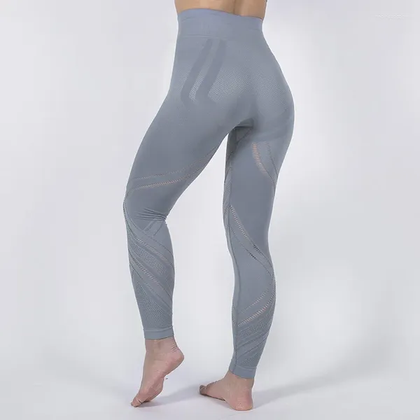 Trajes de yoga Sin costuras Fitness Pantalones de mujer Sexy Hollow Out Sport Leggings Pantalones de cintura alta Push Up Entrenamiento Correr Medias femeninas