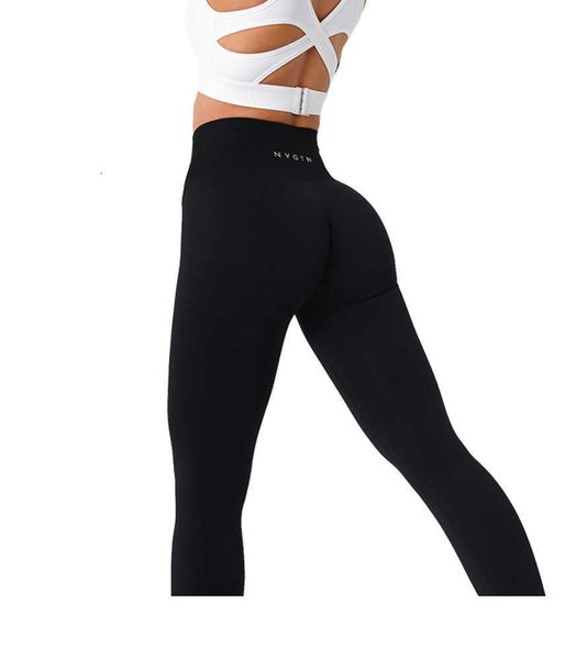 Trajes de yoga Legging sólido sin costuras Medias de entrenamiento suaves Pantalones de fitness Ropa de gimnasia de cintura alta Lycra Spandex