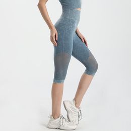 Tenues de yoga Printemps Eté Pantalon taille haute Leggings d'entraînement extensibles Femmes Collants de sport sexy à cinq points Couture en maille