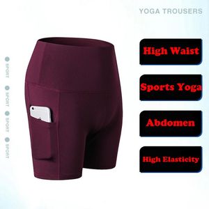 Tenues de yoga femmes poches latérales taille haute sport court entraînement course Fitness Leggings femme Shorts vêtements de sport en gros