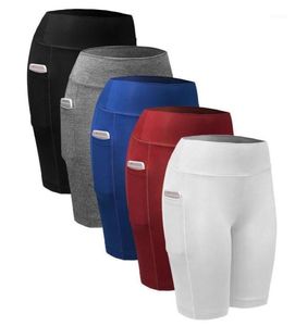 Trajes de yoga Pantalones cortos de entrenamiento para mujer con leggings de bolsillo Pantalones cortos elásticos para mujeres Compresión Trabajo Out Womans19083228