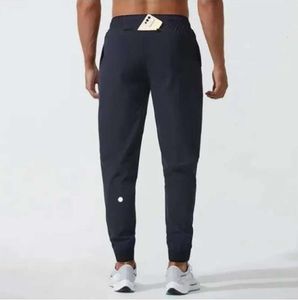 Pantalones de yoga LL Jogger para hombre Traje deportivo largo Cordón de secado rápido Bolsillos para gimnasio Pantalón deportivo Pantalones Casual Cintura elástica fitness lu barbecho