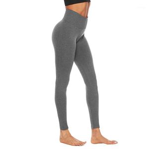 Pantalones de yoga Running Hip Fitness Pantalones deportivos para mujer Leggings Spot Wholesale Lady Slim Pantalón Gimnasio Mujeres