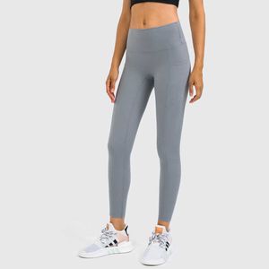 Pantalones de Yoga con bolsillo lateral para mujer, mallas deportivas informales con costuras y cintura alta, Color sólido, para correr, Fitness y gimnasio