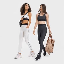 Traje de yoga Sujetador deportivo y mallas Correa de hombro ajustable Sujetador deportivo Cintura elástica Entrenamiento Pantalones de yoga Ropa deportiva para mujer Conjunto de dos piezas A-L-O-001/002