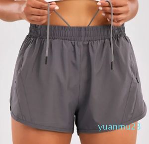 Pantalones deportivos de yoga falsos pantalones de yoga de malla de dos piezas pantalones cortos deportivos americanos para mujeres antiexposición de secado rápido se pueden usar afuera