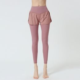 Yogaworld Leggings Designer Tracksuit Femme Ropa de Mujer Girl avec doublure intérieure et couches extérieures Shorts Sports Fiess Femme Faux pantalons en deux pièces