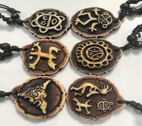 yqtdmy 12 pcs Taino Coqui Frog Cemi Sun Turtles kokopelli imiter le collier yak osseux tous les 6 styles choisis8799521