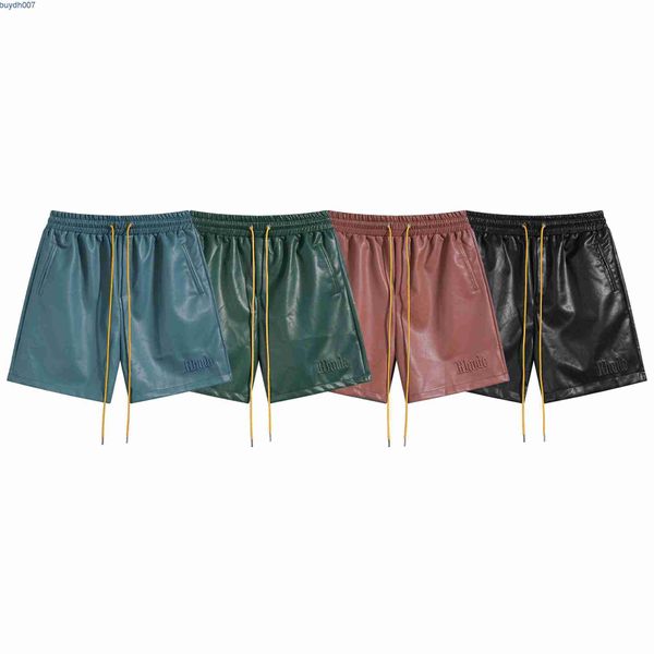 ZBY0 Shorts para hombres Rhude American Street Fashion Letry Bordado Casual Sports PU Leather's Loose Split Pantalones