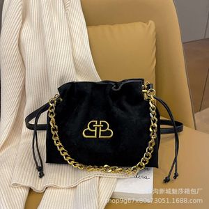 Zhaocai Money-Bolso cruzado con cordón para mujer, nicho de decoración creativa, nuevo Xiaoxiangfeng, 75% de fábrica, venta al por mayor