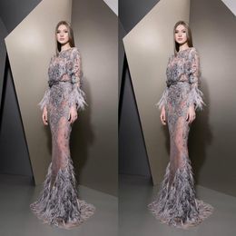 Ziad Nakad 2019 Vestidos de noche Cuello joya Encaje Manga larga Ilusión Vestidos de fiesta de plumas Lujoso Partido de sirena por encargo Runway347g