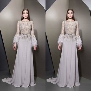 Ziad Nakad Une Ligne 2019 Robes De Soirée Élégantes À Manches Longues Plume Perlée Paillettes Formelles Robes De Bal Sexy Balayage Train Robe De Soirée