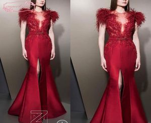 Ziad Nakad prom jurken rood met veren kralen pailletten kristal met riem satijnen voorste spleet avondjurken Arabic9278694