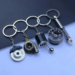 Zinklegering creatief geschenk auto metalen sleutelhanger turbo tandwiel wiel hub huber rem schijf schokdemper hanger schattige auto -accessoires