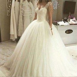 ZJ9082 Sexy Haute Qualité Dentelle Robes De Mariée A-ligne Élégant Blanc Ivoire Perlé Robe De Mariée Perles Manches